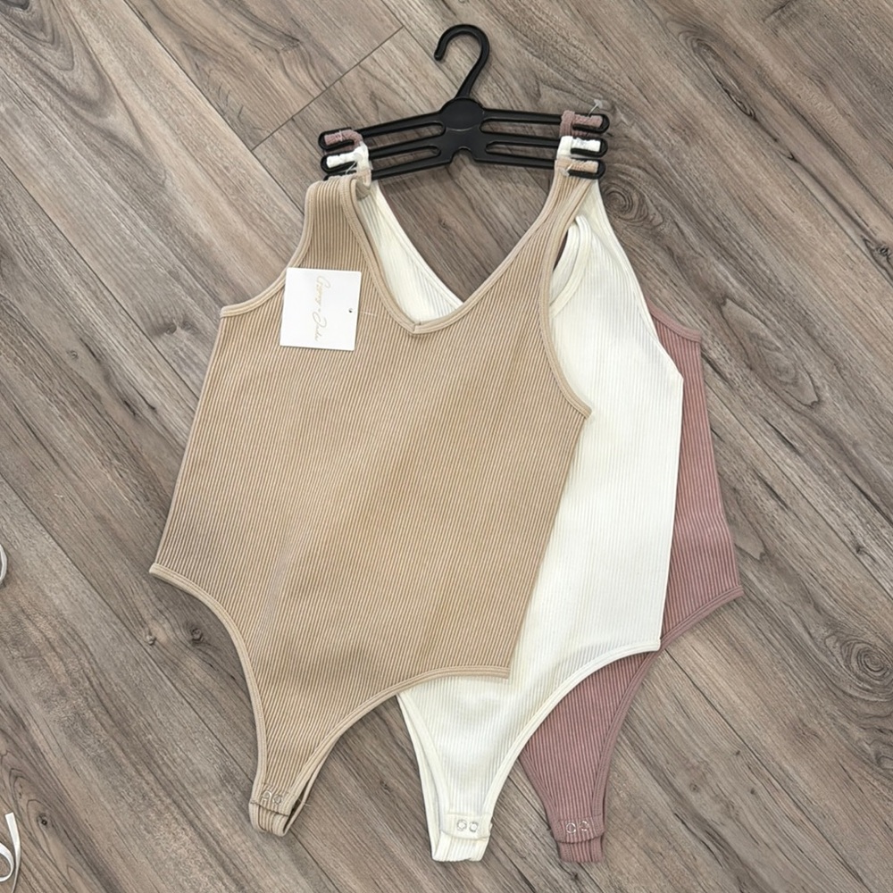 Set of Three Ribbed Bodysuits in Neutral Tones